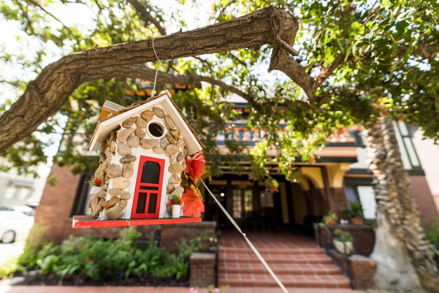 A Birdhouse at the Entrance to the Residences at ACW, created by a resident